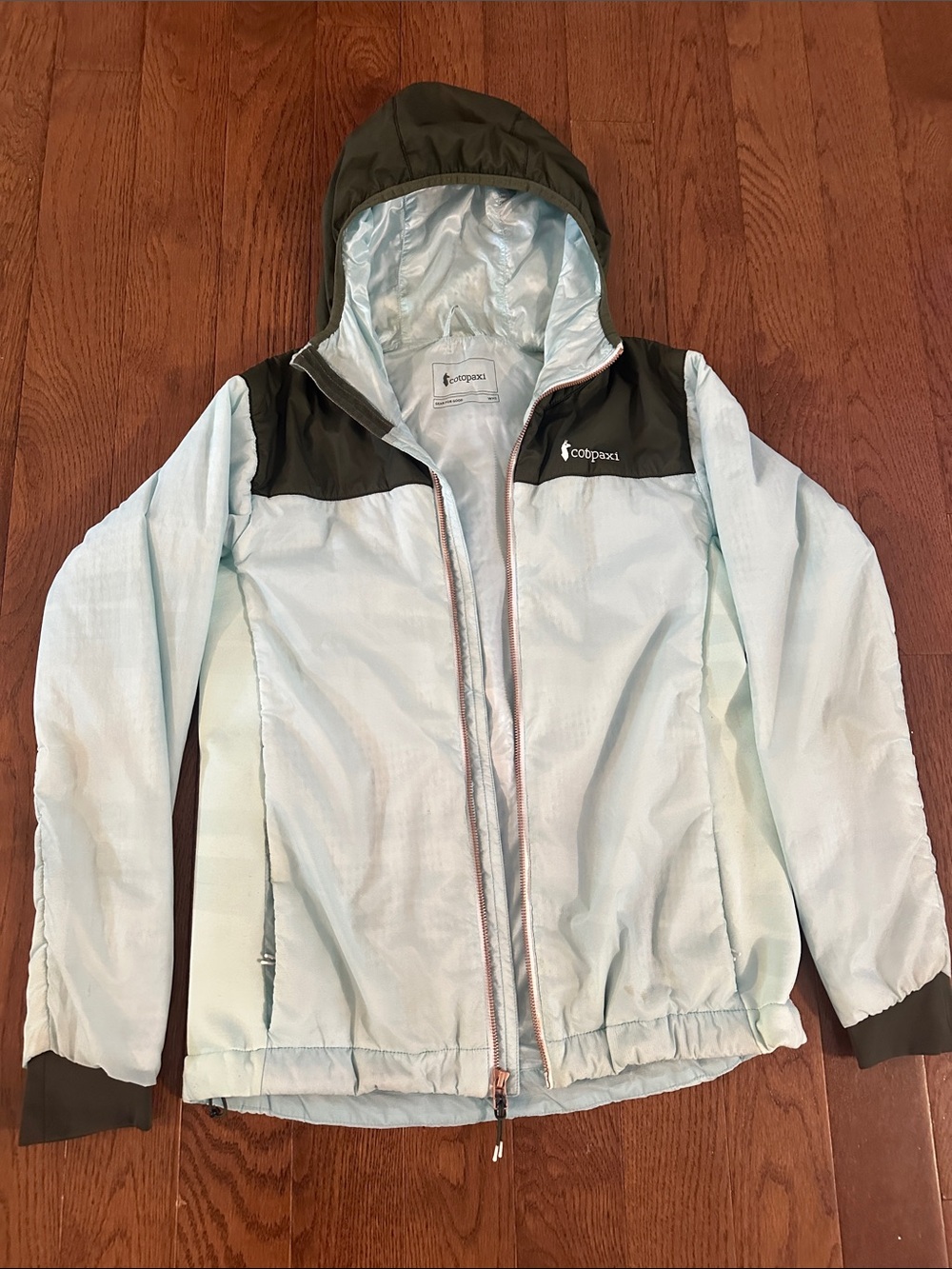 Cotopaxi Women’s Light Blue Hooded Windbreaker Jacket